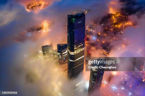 local landmark of qingdao cityscape in the mist, qingdao city, shandong province, china - chinese digital stockfoto's en -beelden