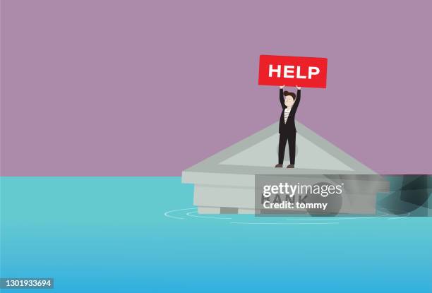 a businessman with a help sign stands on a bank that is going to sink - out of business stock illustrations