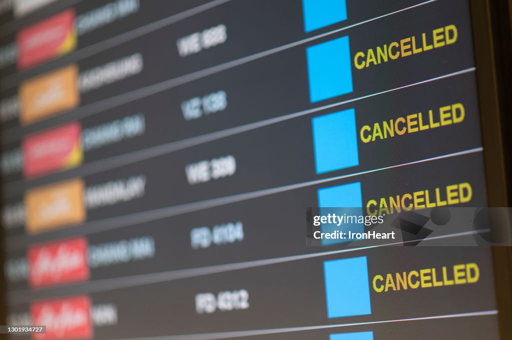 Departure flight board with cancelation at the Airport.