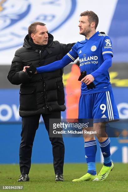 Brendan Rodgers, Manager of Leicester City interacts with Jamie Vardy of Leicester City following the Premier League match between Leicester City and...
