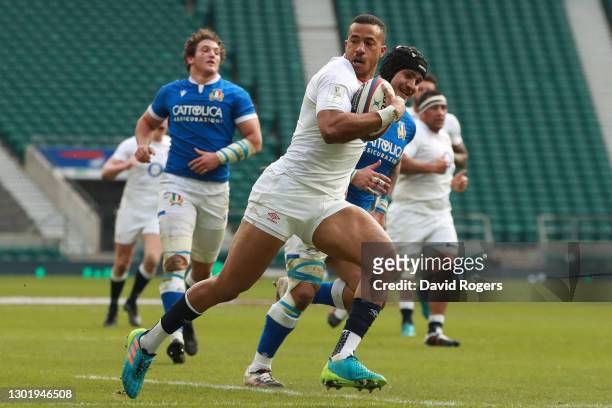 Anthony Watson of England breaks through to go on to score their side's second try during the Guinness Six Nations match between England and Italy at...