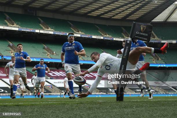 Jonny May of England dives over the line to score their side's third try during the Guinness Six Nations match between England and Italy at...