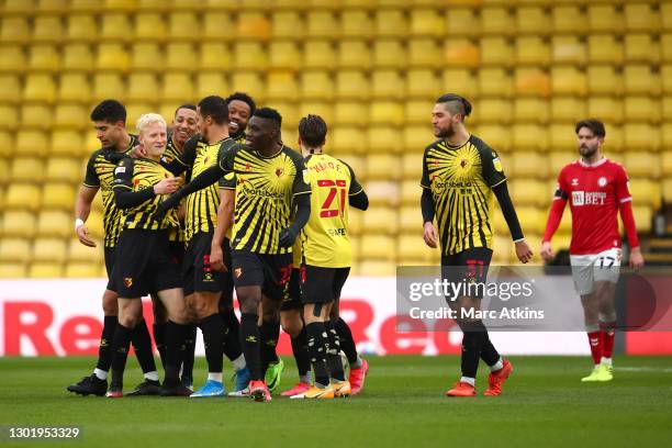 Will Hughes of Watford celebrates with teammates after scoring his team's third goalduring the Sky Bet Championship match between Watford and Bristol...