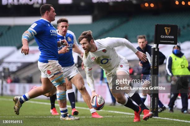 Elliot Daly of England breaks through to score their side's sixth try the Guinness Six Nations match between England and Italy at Twickenham Stadium...