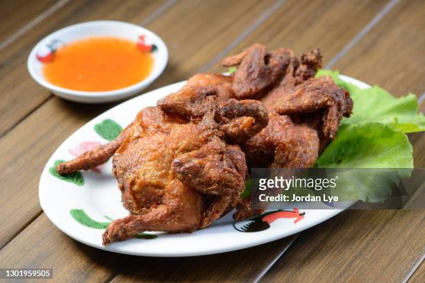 chinese food, roasted pigeon - roast pigeon stock pictures, royalty-free photos & images