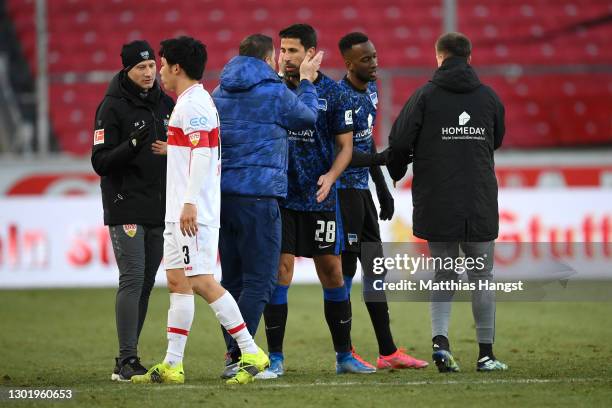 Pal Dardai, Head Coach of Hertha BSC with Sami Khedira of Hertha BSC following the Bundesliga match between VfB Stuttgart and Hertha BSC at...