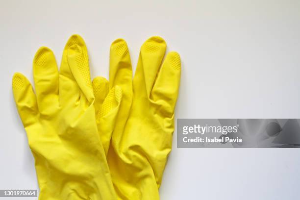 latex gloves. protection concept - gul handske bildbanksfoton och bilder