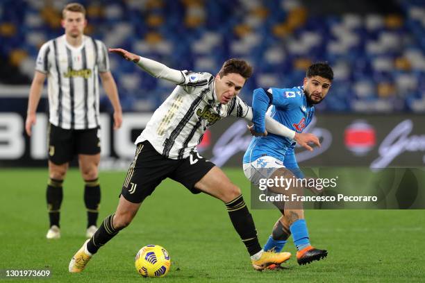 Federico Chiesa of Juventus battles for possession with Lorenzo Insigne of S.S.C. Napoli during the Serie A match between SSC Napoli and Juventus at...