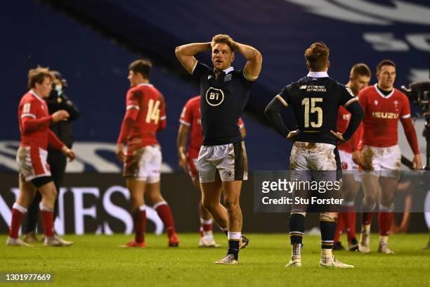 Chris Harris and Stuart Hogg of Scotland look dejected following the Guinness Six Nations match between Scotland and Wales at Murrayfield on February...