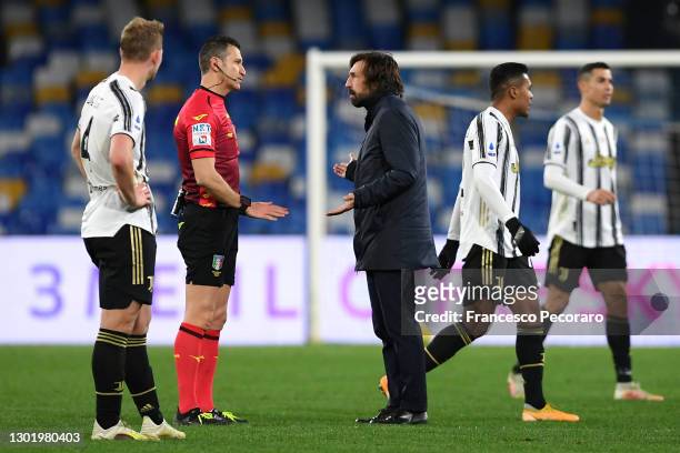 Andrea Pirlo, Head Coach of Juventus speaks with Match Referee, Daniele Doveri following the Serie A match between SSC Napoli and Juventus at Stadio...