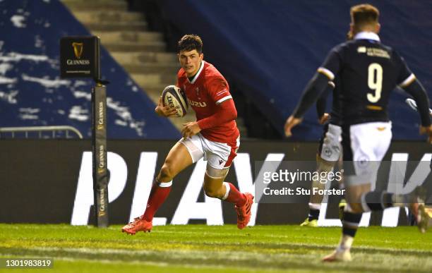 Wales wing Louis Rees-Zammit crosses for his first try during the Guinness Six Nations match between Scotland and Wales at Murrayfield on February...