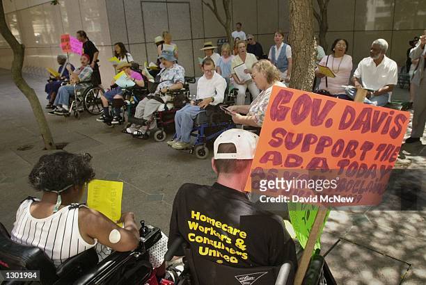 Disabled demonstrators rally June 13, 2000 to protest the state of California''s challenge to the Americans with Disabilities Act of 1990 in the...