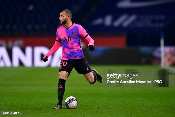 Layvin Kurzawa of Paris Saint-Germain runs with the ball during the Ligue 1 match between Paris Saint-Germain and OGC Nice at Parc des Princes on...