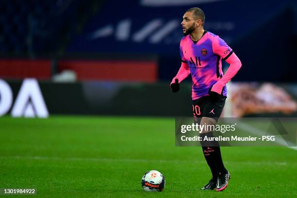 Layvin Kurzawa of Paris Saint-Germain runs with the ball during the Ligue 1 match between Paris Saint-Germain and OGC Nice at Parc des Princes on...