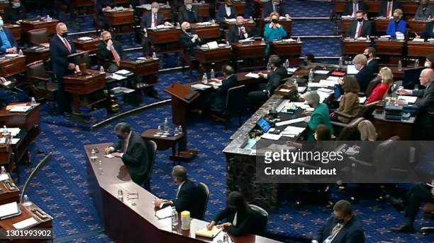 In this screenshot taken from a congress.gov webcast, Majority leader Sen. Chuck Schumer votes guilty as the Senate votes on the fifth day of former...