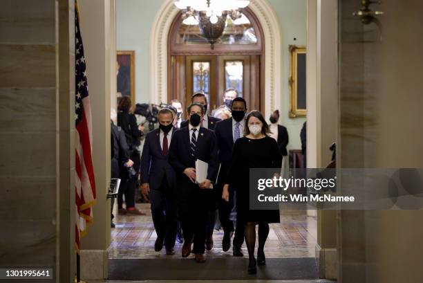 House impeachment managers led by Rep. Jamie Raskin depart the Senate Chamber at the conclusion of former President Donald Trump's second impeachment...