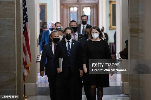 House impeachment managers led by Rep. Jamie Raskin depart the Senate Chamber at the conclusion of former President Donald Trump's second impeachment...