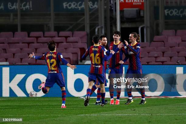 Francisco Trincao of FC Barcelona celebrates with team mates Ricard Puig Marti, Pedri, Lionel Messi and Antoine Griezmann after scoring their side's...