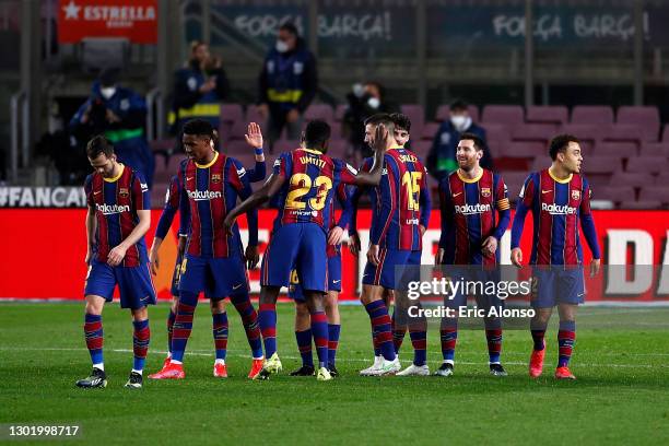 Lionel Messi of FC Barcelona celebrates with team mates after scoring their side's fourth goal during the La Liga Santander match between FC...