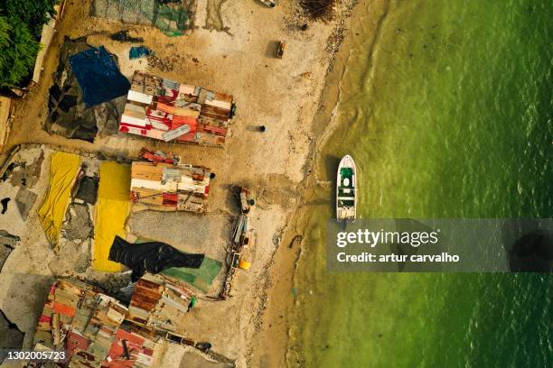 boat in the beach from above, background - angola drone stock pictures, royalty-free photos & images