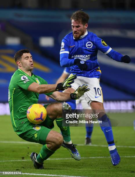 Emiliano Martinez of Aston Villa saves from Alexis Mac Allister of Brighton & Hove Albionduring the Premier League match between Brighton & Hove...