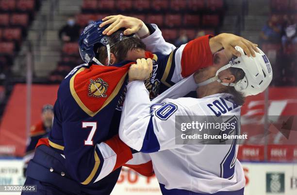 Radko Gudas of the Florida Panthers fights with Blake Coleman of the Tampa Bay Lightning during the third period at the BB&T Center on February 13,...