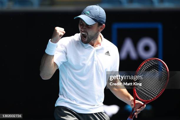 Aslan Karatsev of Russia celebrates after winning a point in his Men's Singles fourth round match against Felix Auger-Aliassime of Canada during day...