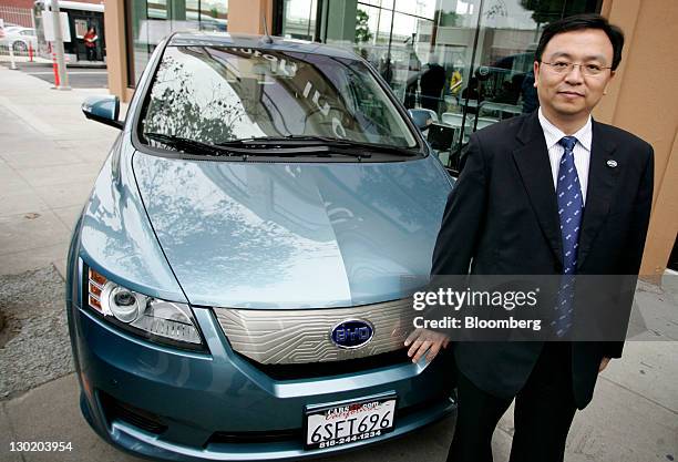 Wang Chuanfu, chairman of Chinese carmaker BYD Co., stands for a photo at the grand opening of the company's North American headquarters in Los...