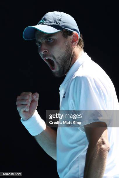 Aslan Karatsev of Russia celebrates after winning a point in his Men's Singles fourth round match against Felix Auger-Aliassime of Canada during day...