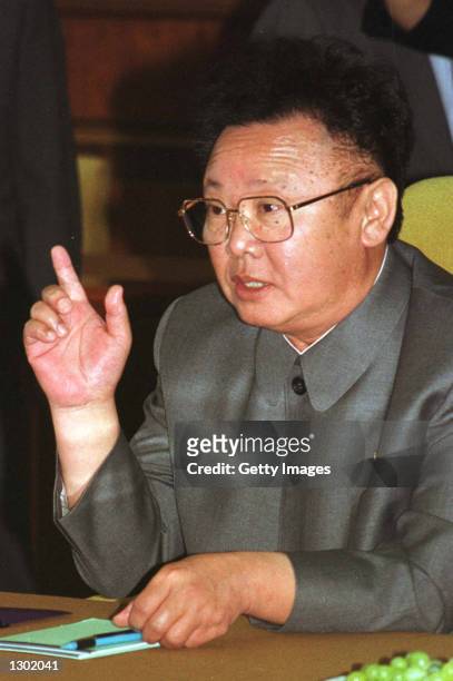 North Korean leader Kim Jong-il gestures during second round talks with South Korean President Kim Dae-jung, June 14, 2000 at Baekhwawon State Guest...
