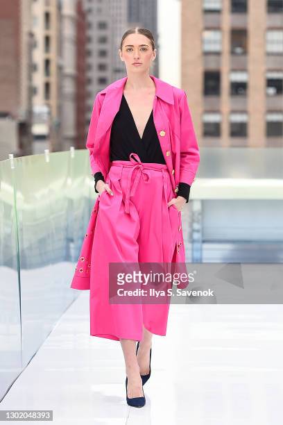 Model walks the runway wearing Alexandra Popescu-York during the Flying Solo show on February 13, 2021 in New York City.
