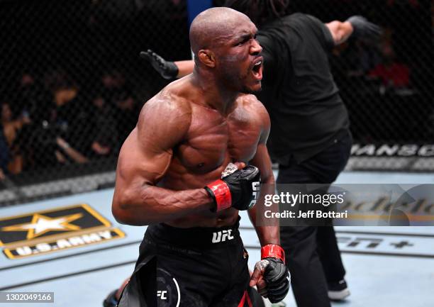 Kamaru Usman of Nigeria reacts after his victory over Gilbert Burns of Brazil in their UFC welterweight championship fight during the UFC 258 event...