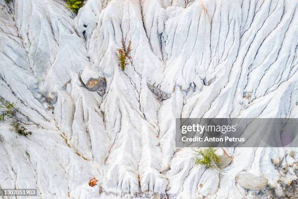 aerial view of the old chalk quarry. soil erosion - lime quarry ストックフォトと画像