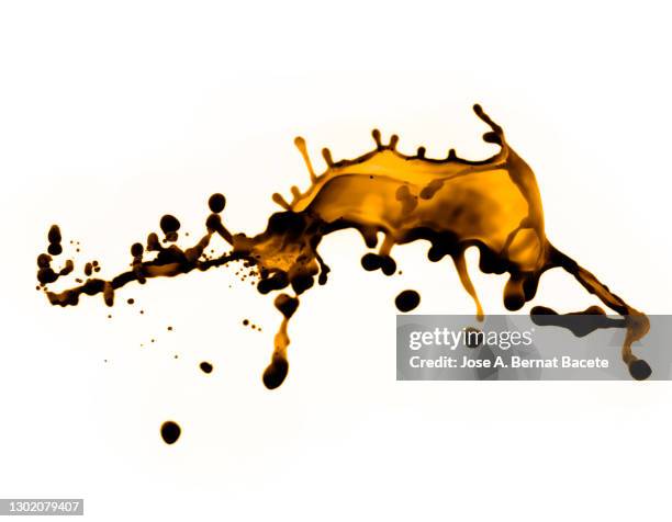full frame of abstract shapes and textures formed by drops of coffee liquid. - coffee splash stockfoto's en -beelden