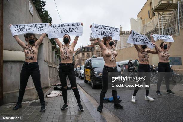 Activists of the Femen group protest at the arrival of the VOX candidate, Ignacio Garriga, at the electoral college during Catalonia's Regional...