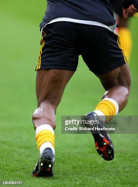 The legs of Adama Traore of Wolverhampton Wanderers are seen as he warms up prior to the Premier League match between Southampton and Wolverhampton...