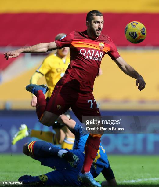 Henrikh Mkhitaryan of Roma is fouled by Juan Musso of Udinese Calcio resulting in a penalty during the Serie A match between AS Roma and Udinese...