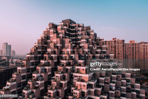 pyramid-shape residential building - block flats stock pictures, royalty-free photos & images