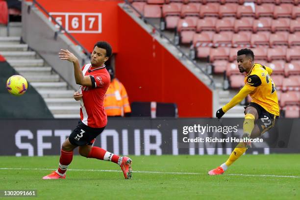 Ryan Bertrand of Southampton handles the ball after it is hit by Nelson Semedo of Wolverhampton Wanderers leading to a penalty during the Premier...