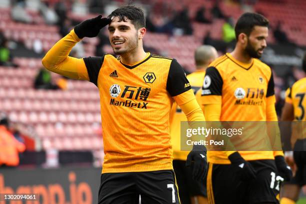 Pedro Neto of Wolverhampton Wanderers celebrates with teammates after scoring their team's second goal during the Premier League match between...