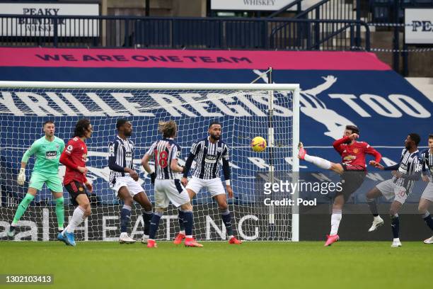 Bruno Fernandes of Manchester United scores their team's first goal during the Premier League match between West Bromwich Albion and Manchester...