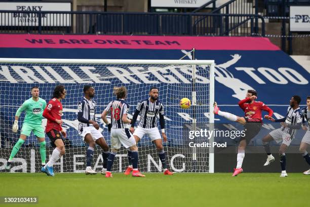 Bruno Fernandes of Manchester United scores their team's first goal during the Premier League match between West Bromwich Albion and Manchester...