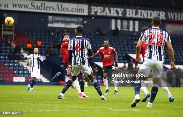 Bruno Fernandes of Manchester United scores their side's first goal during the Premier League match between West Bromwich Albion and Manchester...