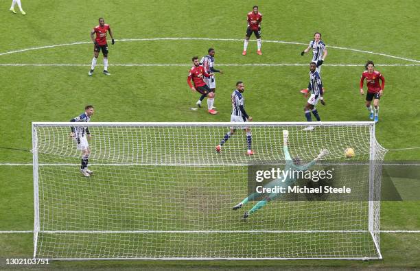 Bruno Fernandes of Manchester United scores their side's first goal during the Premier League match between West Bromwich Albion and Manchester...