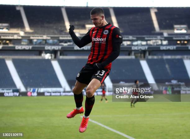 Andre Silva of Eintracht Frankfurt celebrates after scoring their team's first goal during the Bundesliga match between Eintracht Frankfurt and 1. FC...