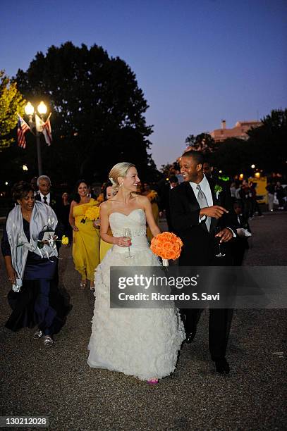 Sports anchor Lindsay Czarniak and MSNBC anchor and NBC News correspondent Craig Melvin walk near Lafayette Park after their wedding on October 15,...