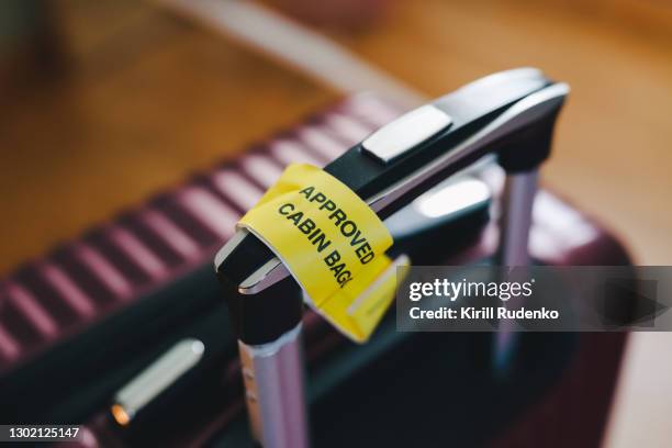 suitcase with a lable - labelling stock pictures, royalty-free photos & images