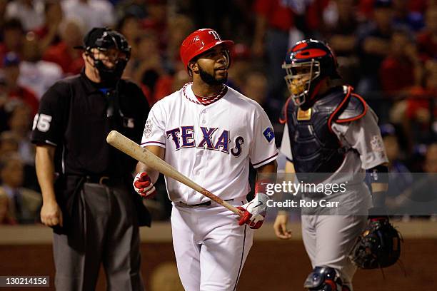 Elvis Andrus of the Texas Rangers reacts after striking out in the seventh inning during Game Five of the MLB World Series against the St. Louis...