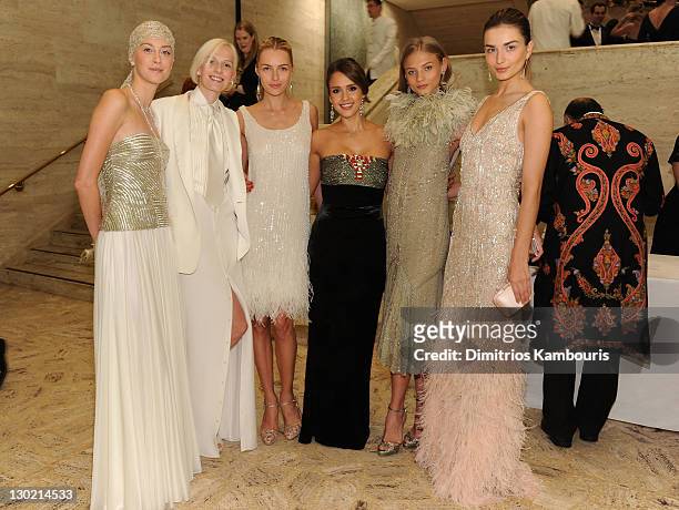 Jessica Alba poses with models during an evening with Ralph Lauren hosted by Oprah Winfrey and presented at Lincoln Center on October 24, 2011 in New...
