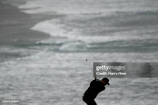 Paul Casey of England plays his second shot on the ninth hole during the final round of the AT&T Pebble Beach Pro-Am at Pebble Beach Golf Links on...